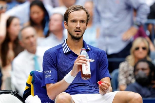 Daniil Medvedev of Russia looks on from his chair between games as he plays against Novak Djokovic of Serbia during their Men's Singles final match...