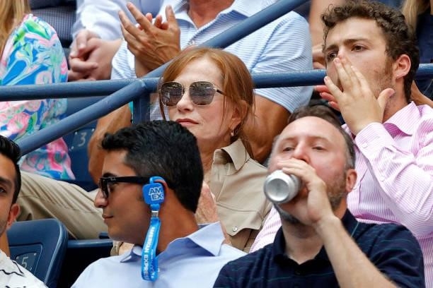 Actress Isabelle Huppert watches the Men's Singles final match between Daniil Medvedev of Russia and Novak Djokovic of Serbia on Day Fourteen of the...