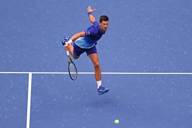 Novak Djokovic of Serbia returns the ball against Daniil Medvedev of Russia during their Men's Singles final match on Day Fourteen of the 2021 US...