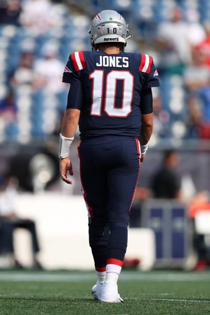 Mac Jones of the New England Patriots looks on prior to the game against the Miami Dolphins at Gillette Stadium on September 12, 2021 in Foxborough,...