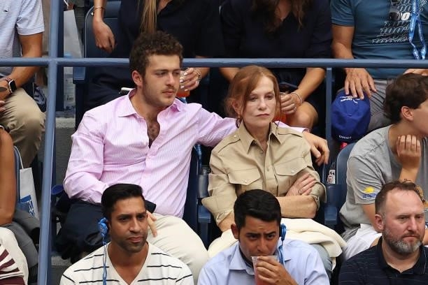Actress Isabelle Huppert watches the Men's Singles final match between Daniil Medvedev of Russia and Novak Djokovic of Serbia on Day Fourteen of the...