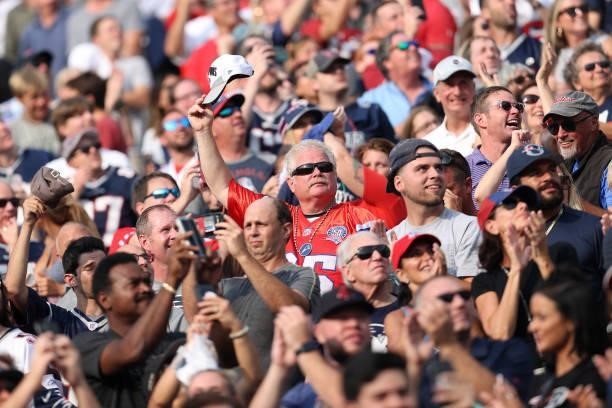 New England Patriots fans attend the game against the Miami Dolphins at Gillette Stadium on September 12, 2021 in Foxborough, Massachusetts.
