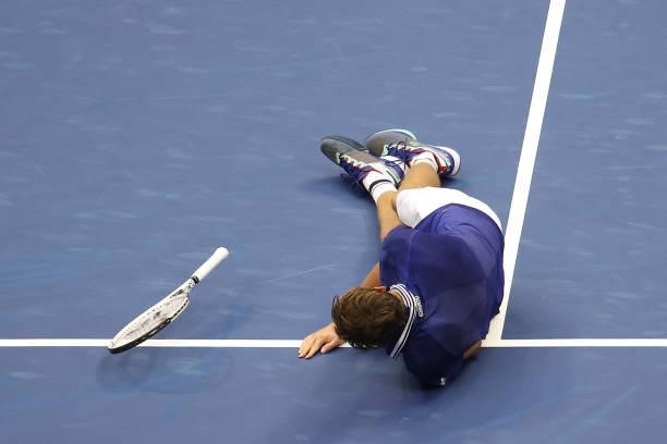 Daniil Medvedev of Russia celebrates winning championship point to defeat Novak Djokovic of Serbia during their Men's Singles final match on Day...