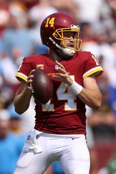 Ryan Fitzpatrick of the Washington Football Team looks to pass during the game against the Los Angeles Chargers at FedExField on September 12, 2021...