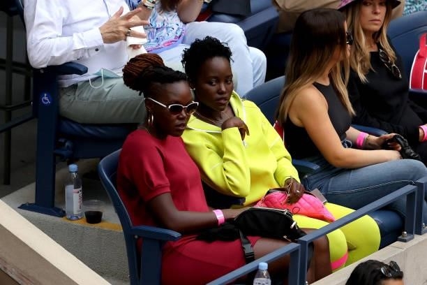 Actress Lupita Nyong'o watches the Men's Singles final match between Daniil Medvedev of Russia and Novak Djokovic of Serbia on Day Fourteen of the...