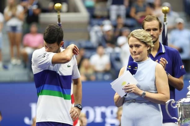 Runner up Novak Djokovic of Serbia speaks during the trophy ceremony after being defeated by Daniil Medvedev of Russia during their Men's Singles...