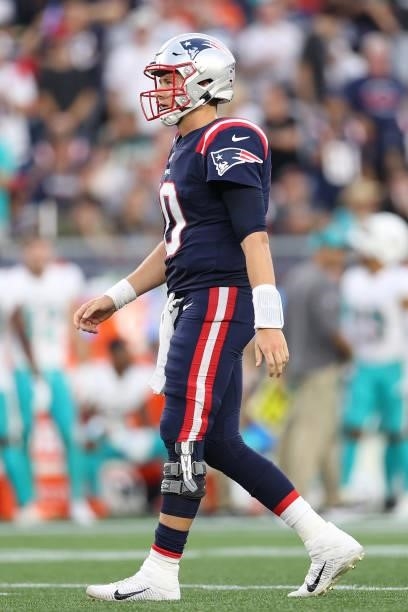 Mac Jones of the New England Patriots looks on against the Miami Dolphins at Gillette Stadium on September 12, 2021 in Foxborough, Massachusetts.