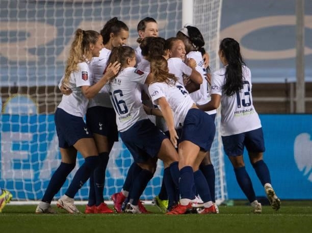 Tottenham Hotspur players celebrate their second and winning goal during the Barclays FA Women's Super League match between Manchester City Women and...
