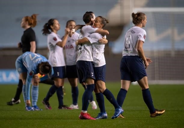 Ashleigh Neville and Ria Percival of Tottenham Hotspur celebrate at the final whistle of the Barclays FA Women's Super League match between...