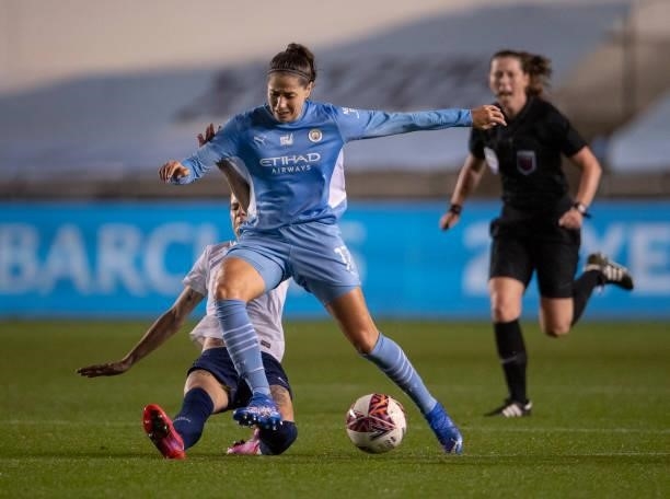 Vicky Losada of Manchester City and Ashleigh Neville of Tottenham Hotspur in action during the Barclays FA Women's Super League match between...