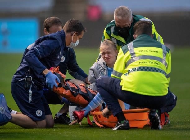 Esme Morgan of Manchester City is stretchered off after she is badly injured during the Barclays FA Women's Super League match between Manchester...