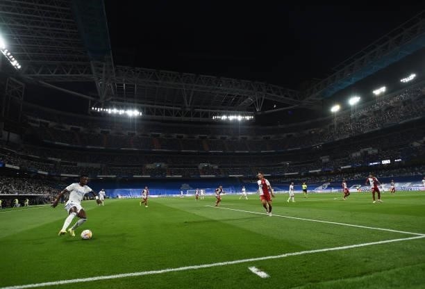 Vinicius Junior of Real Madrid controls the ball during the La Liga Santander match between Real Madrid CF and RC Celta de Vigo at Estadio Santiago...