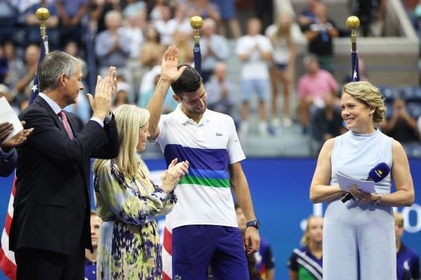 Runner up Novak Djokovic of Serbia reacts during the trophy ceremony after being defeated by Daniil Medvedev of Russia during their Men's Singles...