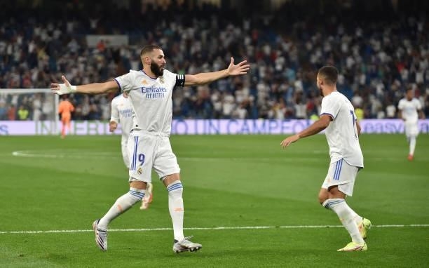 Karim Benzema of Real Madrid celebrates after scoring their team's 2nd goal during the La Liga Santander match between Real Madrid CF and RC Celta de...