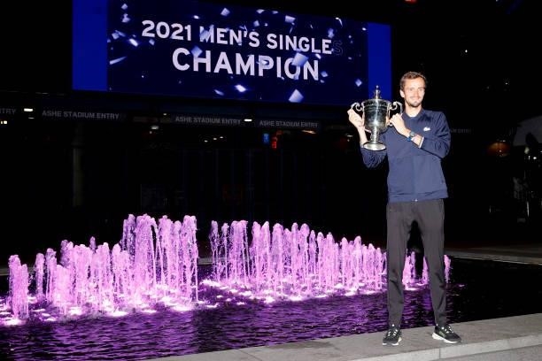 Daniil Medvedev of Russia celebrates with the championship trophy after defeating Novak Djokovic of Serbia to win the Men's Singles final match on...