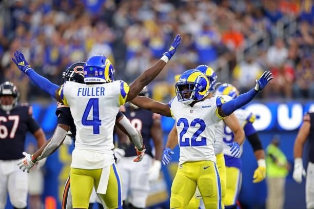 Jordan Fuller and David Long of the Los Angeles Rams react to a defensive stop during the first half against the Chicago Bears at SoFi Stadium on...