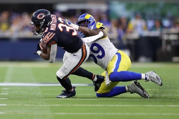 David Montgomery of the Chicago Bears is brought down by Sebastian Joseph-Day of the Los Angeles Rams during the first half at SoFi Stadium on...