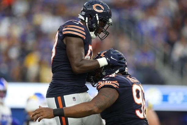 Roquan Smith and Akiem Hicks of the Chicago Bears celebrate a sack during the first half against the Los Angeles Rams at SoFi Stadium on September...