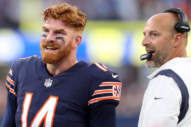 Andy Dalton speaks with head coach Matt Nagy of the Chicago Bears during the first half against the Los Angeles Rams at SoFi Stadium on September 12,...