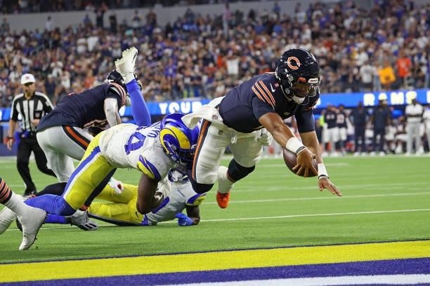 Justin Fields of the Chicago Bears dives for a touchdown during the second half against the Los Angeles Rams at SoFi Stadium on September 12, 2021 in...