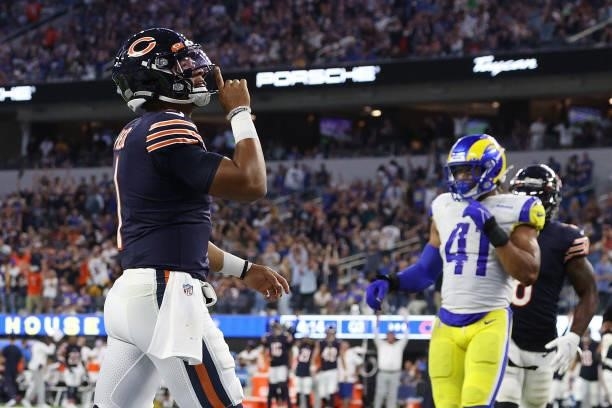 Justin Fields of the Chicago Bears celebrates a touchdown during the second half against the Los Angeles Rams at SoFi Stadium on September 12, 2021...