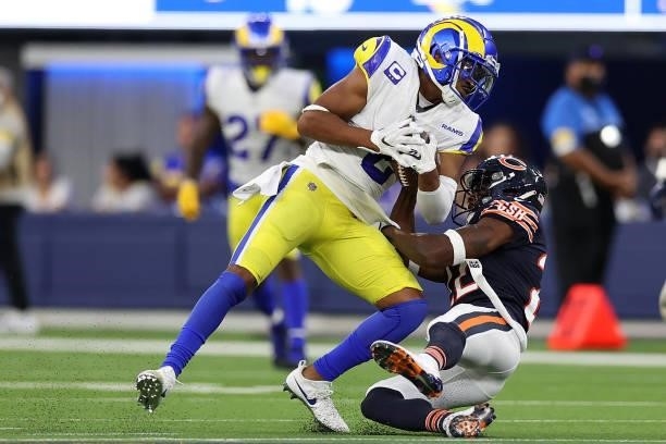 Robert Woods of the Los Angeles Rams is brought down by Kindle Vildor of the Chicago Bears during the second half at SoFi Stadium on September 12,...
