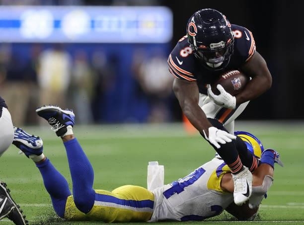 Damien Williams of the Chicago Bears is brought down by Taylor Rapp of the Los Angeles Rams during the second half at SoFi Stadium on September 12,...