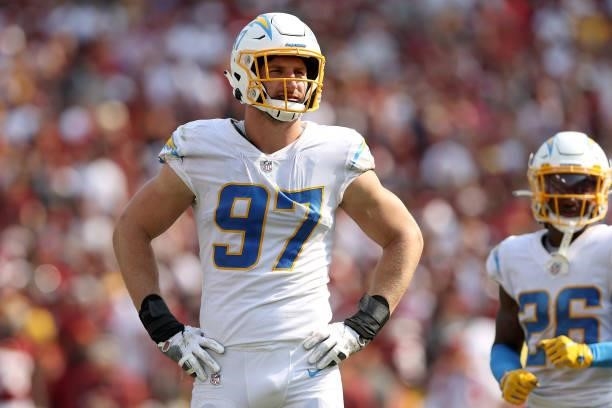 Defensive end Joey Bosa of the Los Angeles Chargers look on in the second half against the Washington Football Team at FedExField on September 12,...