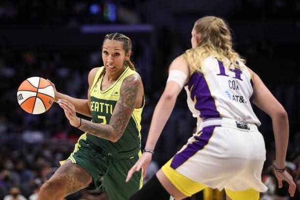 Center Mercedes Russell of the Seattle Storm handles the ball defended by forward Lauren Cox of the Los Angeles Sparks in the second half at Staples...