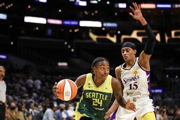 Guard Jewell Loyd of the Seattle Storm drives to the basket defended by guard Brittney Sykes of the Los Angeles Sparks in the second half at Staples...
