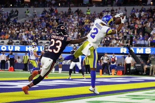 Robert Woods of the Los Angeles Rams catches a pass for a touchdown in front of Marqui Christian of the Chicago Bears during the second half at SoFi...