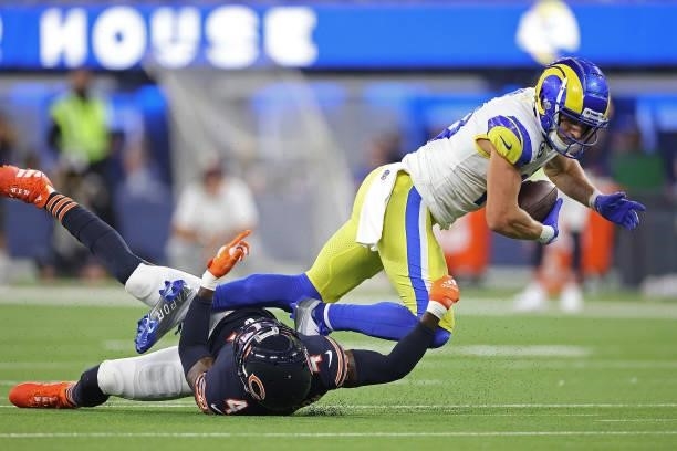 Cooper Kupp of the Los Angeles Rams is brought down by Eddie Jackson of the Chicago Bears during the second half at SoFi Stadium on September 12,...