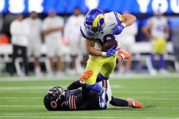 Cooper Kupp of the Los Angeles Rams is brought down by Eddie Jackson of the Chicago Bears during the second half at SoFi Stadium on September 12,...
