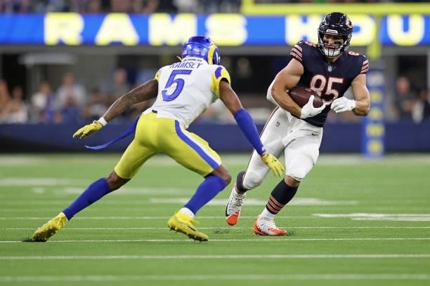 Cole Kmet of the Chicago Bears is pursued by Jalen Ramsey of the Los Angeles Rams during the second half at SoFi Stadium on September 12, 2021 in...