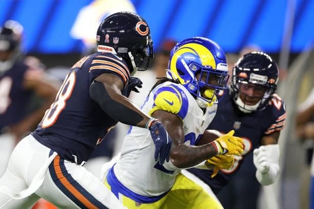 Darrell Henderson of the Los Angeles Rams is pursued by Tashaun Gipson of the Chicago Bears \d2 at SoFi Stadium on September 12, 2021 in Inglewood,...