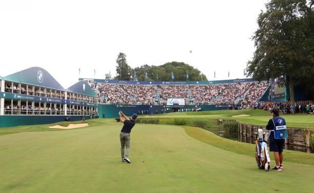 Billy Horschel of the United States of America plays his third shot on the 18th hole during Day Four of The BMW PGA Championship at Wentworth Golf...