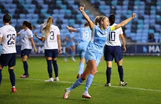 Steph Houghton of Manchester City runs away to celebrate her teams first goal scored by Lauren Hemp during the Barclays FA Women's Super League match...
