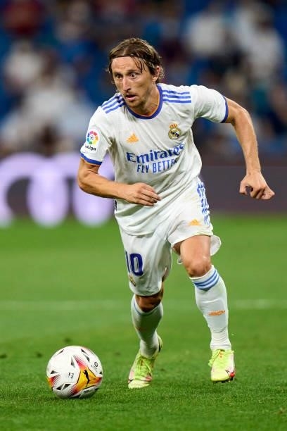 Luka Modric of Real Madrid runs with the ball during the La Liga Santader match between Real Madrid CF and RC Celta de Vigo at Estadio Santiago...