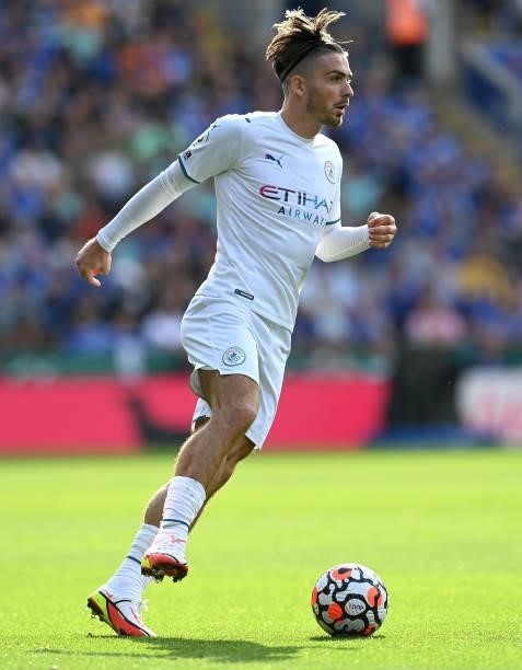 Jack Grealish of Manchester City runs with the ball during the Premier League match between Leicester City and Manchester City at The King Power...
