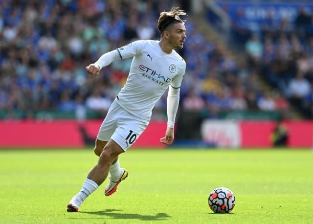 Jack Grealish of Manchester City runs with the ball during the Premier League match between Leicester City and Manchester City at The King Power...