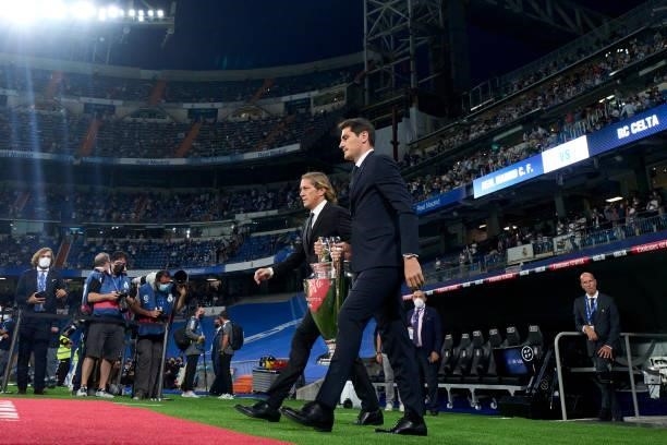 Players of Real Madrid carry the trophies that Lorenzo Sanz won as president of Real Madrid during a ceremony for former Real President Lorenzo Sanz...
