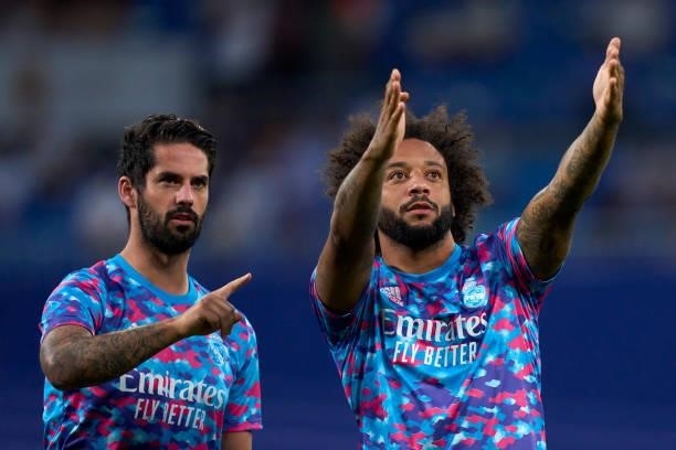 Marcelo and Isco of Real Madrid reacts prior the game during the La Liga Santander match between Real Madrid CF and RC Celta de Vigo at Estadio...