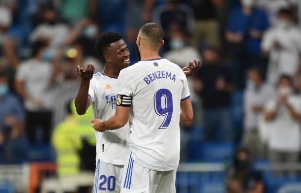 Karim Benzema of Real Madrid celebrates with Vinicius Junior after scoring their team's 5th goal from the penalty spot during the La Liga Santander...