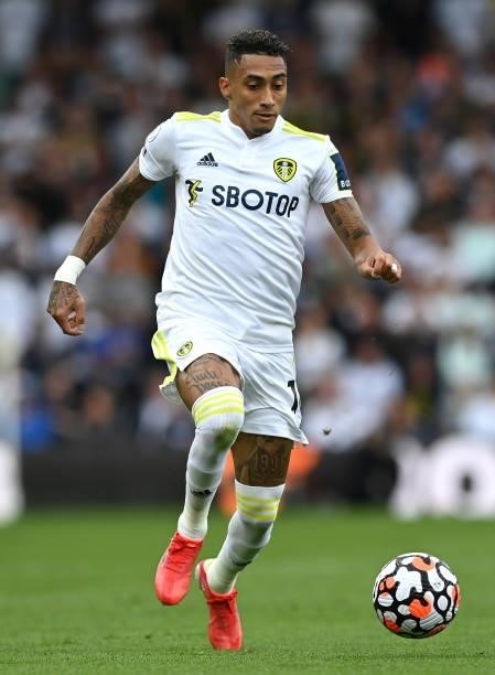 Raphinha of Leeds United runs with the ball during the Premier League match between Leeds United and Liverpool at Elland Road on September 12, 2021...