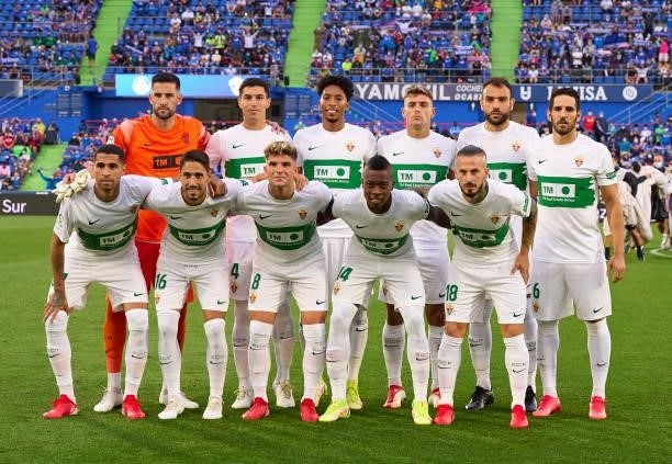 The Elche CF team line up for a photo prior to kick off during the La Liga Santander match between Getafe CF and Elche CF at Coliseum Alfonso Perez...