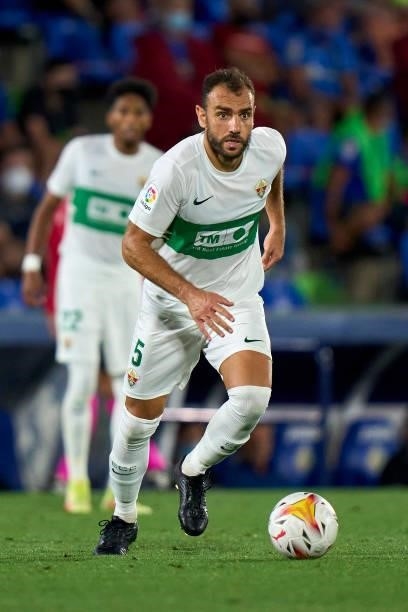 Gonzalo Verdu of Elche CF runs with the ball during the La Liga Santander match between Getafe CF and Elche CF at Coliseum Alfonso Perez on September...