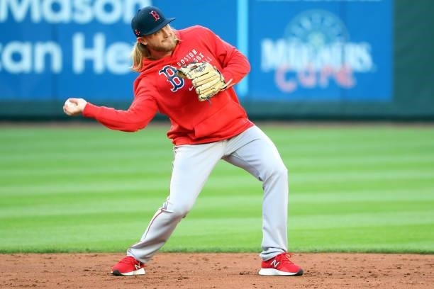 Taylor Motter of the Boston Red Sox warms up before the game against the Seattle Mariners at T-Mobile Park on September 13, 2021 in Seattle,...