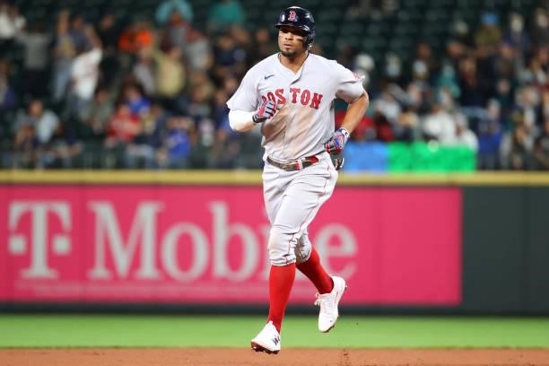 Xander Bogaerts of the Boston Red Sox runs the bases after hitting a solo home run against the Seattle Mariners in the eighth inning at T-Mobile Park...