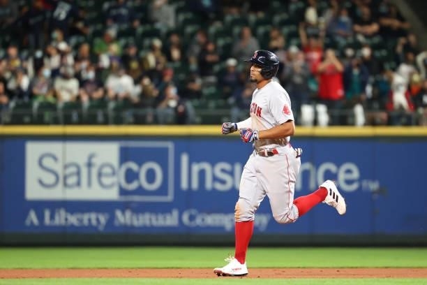 Xander Bogaerts of the Boston Red Sox runs the bases after hitting a solo home run against the Seattle Mariners in the eighth inning at T-Mobile Park...