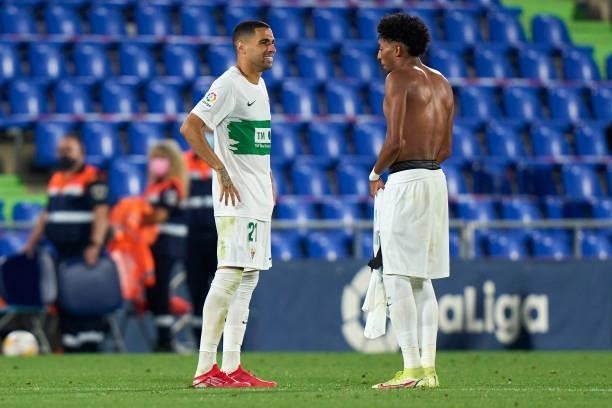 Omar Mascarell and Johan Mojica of Elche CF speaking after the game during the La Liga Santander match between Getafe CF and Elche CF at Coliseum...